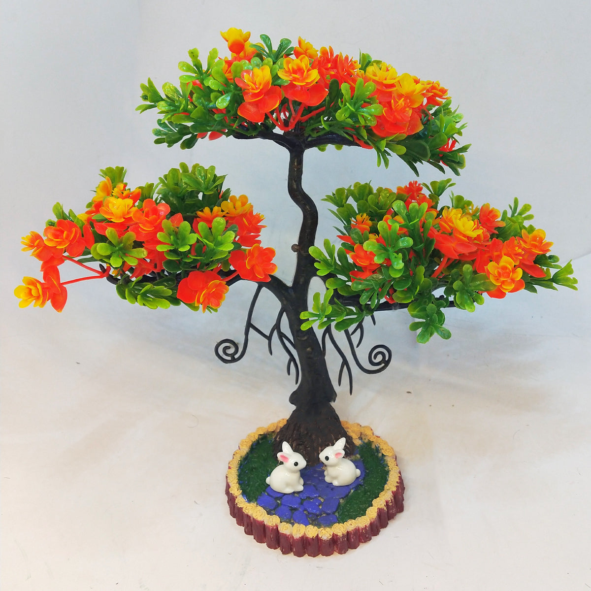 Rakakart-graceful artificial plant with tiny rabbits for home decor.