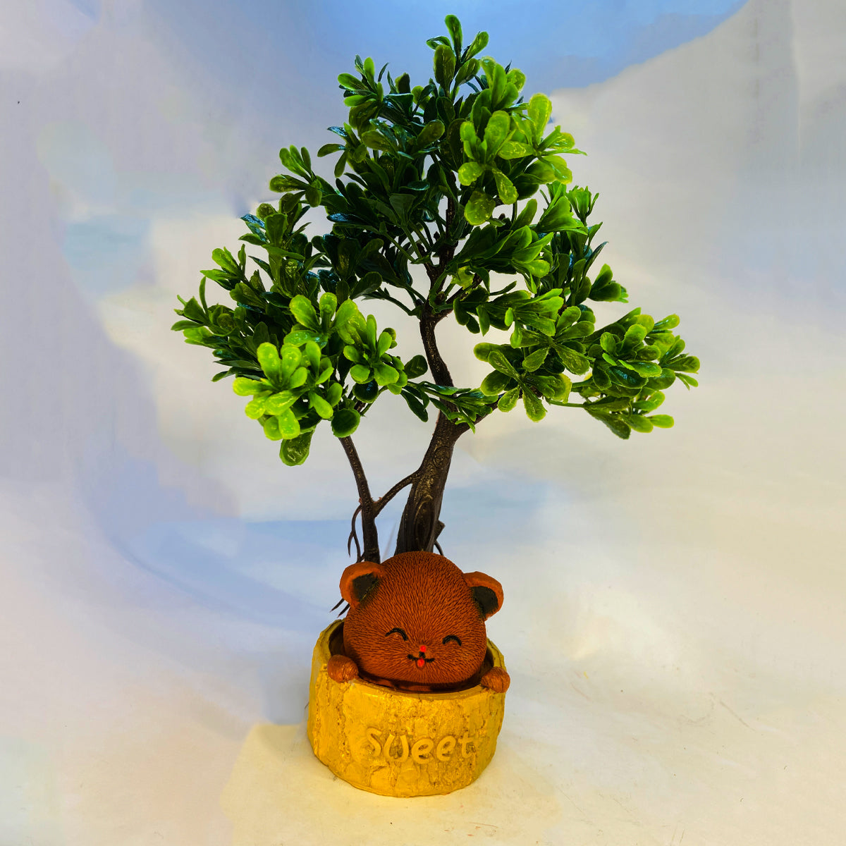 Mini dudu bear under the tree for home decoration